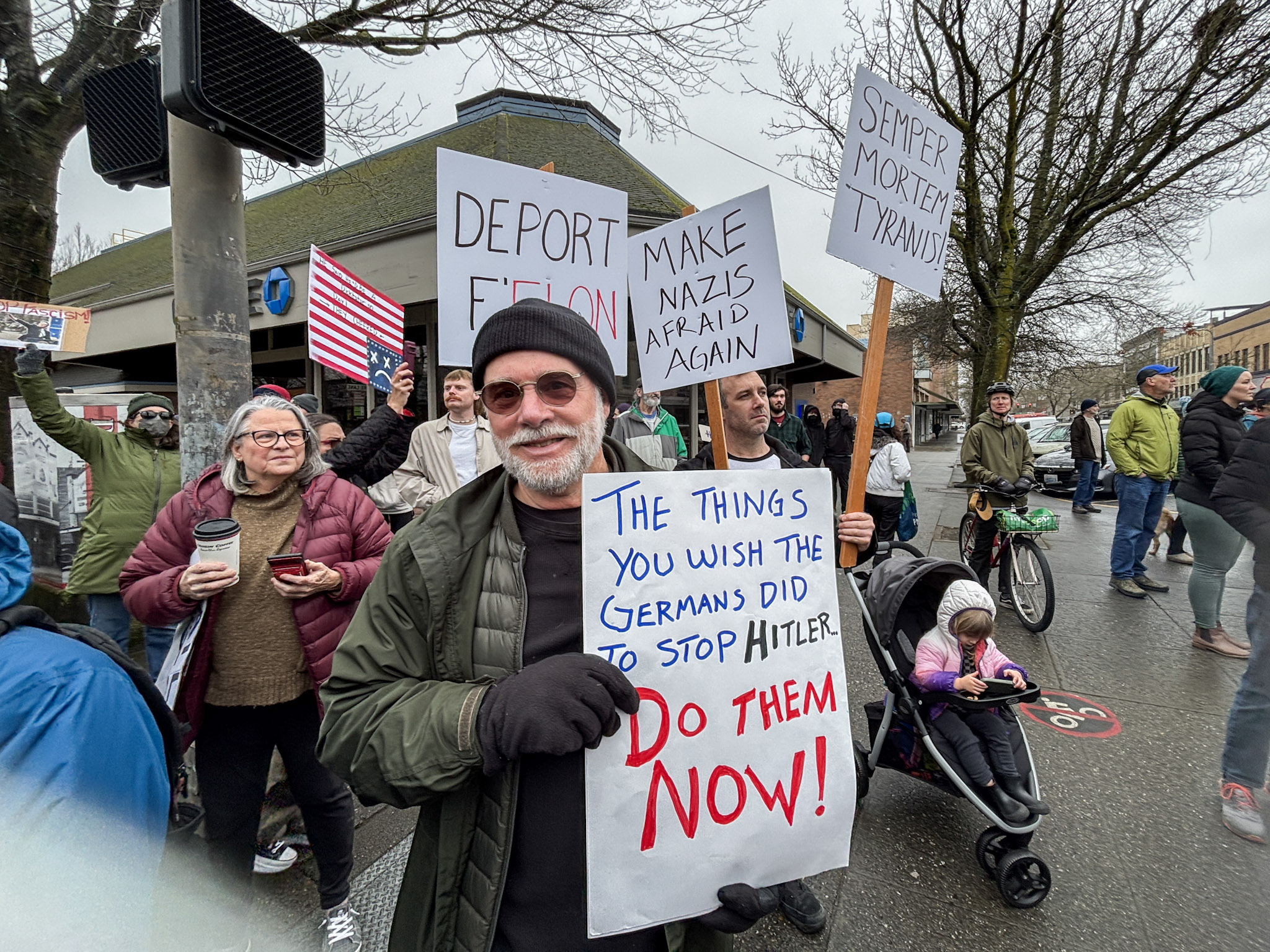 Hundreds gather in protest against Trump administration in downtown ...