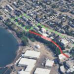 Aerial map showing a red curved 'CLOSED' road near 11th St with a green dotted detour along Taylor Ave, 10th St, and Mill Ave by the waterfront.