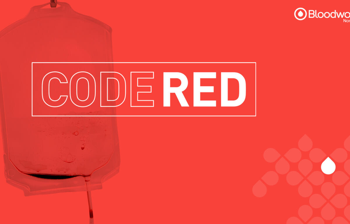 Bloodworks Northwest banner reading CODE RED with a blood bag on a red background and the logo in the corner.