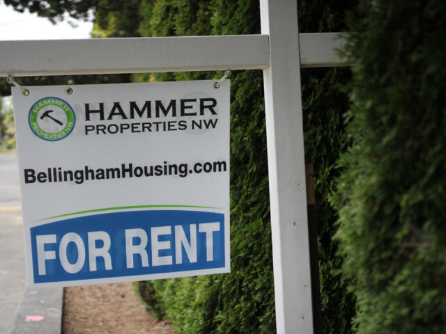 For rent sign posted by Hammer Properties NW, featuring BellinghamHousing.com on the sign.
