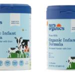 Two Nara Organics Organic Infant Formula cans with blue lids, labeled milk-based powder with iron, featuring cow illustrations on the label.