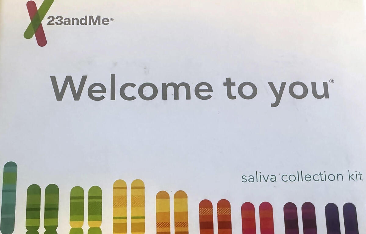 23andMe logo with the words 'Welcome to you' and a rainbow of vertical color bars beneath.