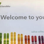 23andMe logo with the words 'Welcome to you' and a rainbow of vertical color bars beneath.