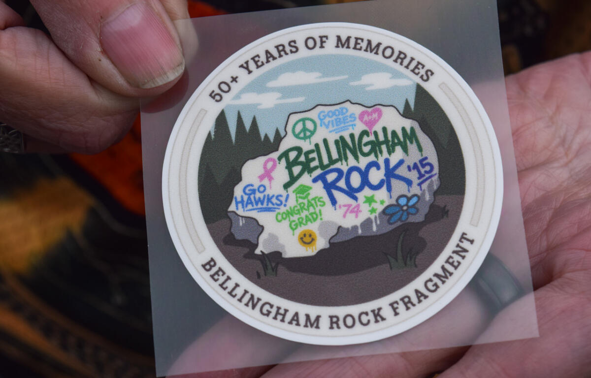 Circular sticker celebrating Bellingham Rock Fragment; graffiti-style rock with 'Go Hawks!', 'Congrats Grad!', and 'Rock ’15' in a forest scene; outer edge reads '50+ Years of Memories'