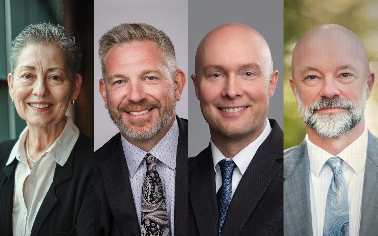 Four business professionals photographed in a collage: woman on left, then three men in suits smiling.