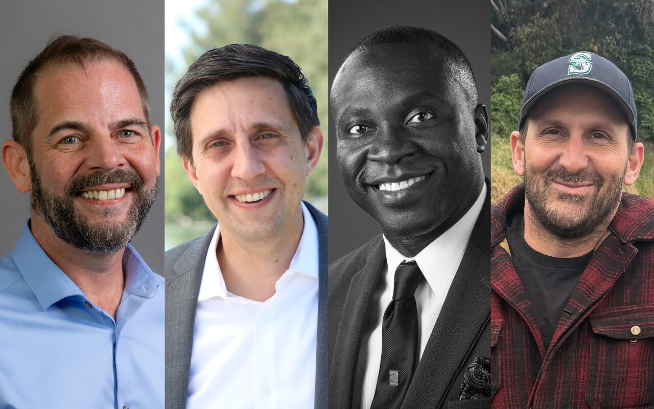 Collage of four smiling men from left to right: bearded in a light blue shirt, blazer with white shirt, Black man in a suit and tie (black-and-white), and man in a cap with a red plaid jacket outdoors.